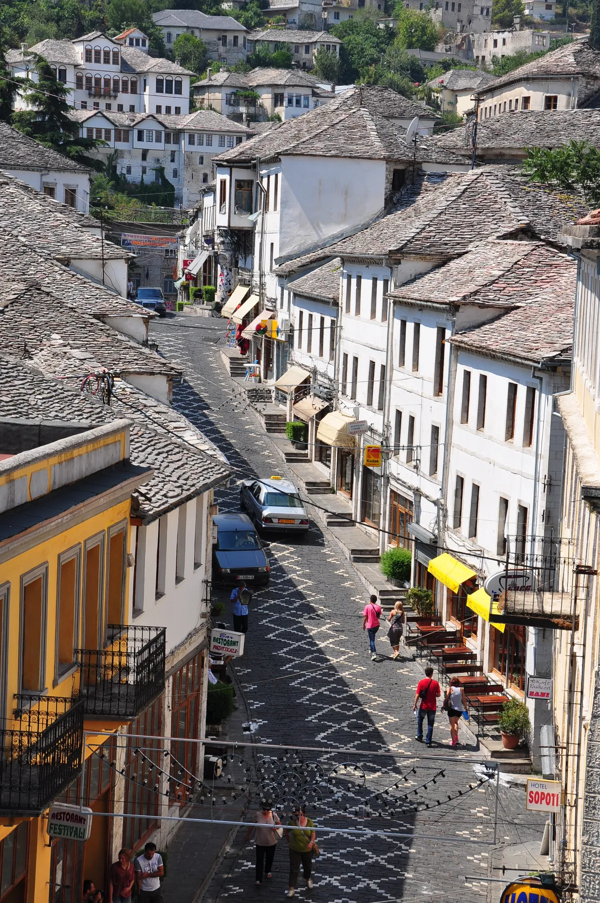 A cobbled street of stone houses in Gjirokastër